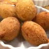 Coxinha creme no palito